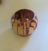 This segmented wood and resin hollow form won a commended certificate for Ted Hogben